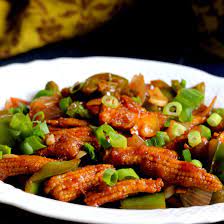 Baby corn chilly (fried baby corn cocked in Chinese style)
