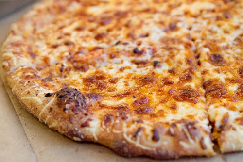 Orange chedder and mozzarella pizza