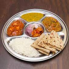 Veg Thali Rice, (Roti - 2pc) Veg, Dal, Papad, Dahi/Sweet Pickle, Salad