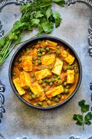 Mutter paneer (fried paneer coocked with gravy)